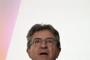 Hard-left leader Jean-Luc Melenchon delivers a speech at his election night headquarters after the first round of the parliamentary election Sunday, June 12, 2022 in Paris. Projections show French President Macron is expected to keep a parliamentary majority after 1st round of voting. (AP Photo/Christophe Ena)