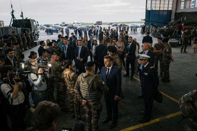 Mr. Macron arrives with Foreign Minister Catherine Colonna at the NATO military base at Mihail-Kogalniceanu, Romania, June 14, 2022. 