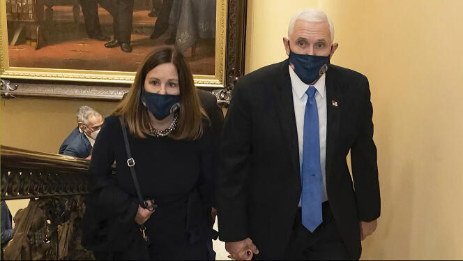 An image from a video released by a delegation of investigators showing Mike Pence and his wife Karen walking through the Capitol on January 6 during the Commission of Inquiry's third public hearing on the attack on Capitol in Washington, June.  16, 2022.