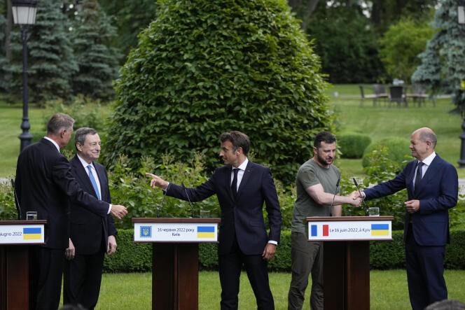 From left, Romanian President Klaus Iohannis, Prime Minister of Italy Mario Draghi, France's President Emmanuel Macron, Ukraine President Volodymyr Zelensky and German Chancellor Olaf Scholz leave at the end of a conference at the Mariyinsky palace in Kyiv, Ukraine, Thursday, June 16, 2022.