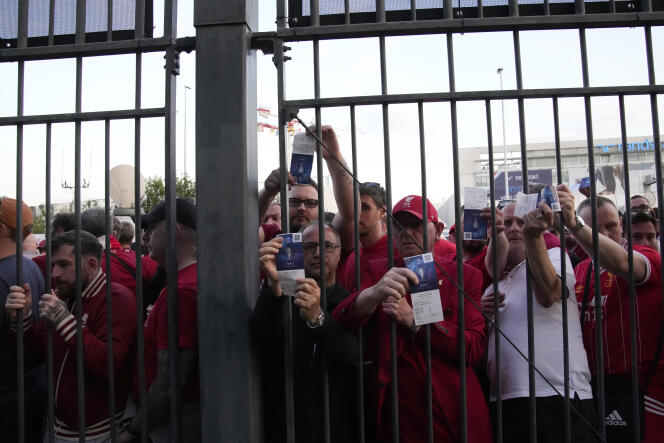Liverpool fans are stuck at the entrance of the Stade de France before the UEFA Champions League final on May 28, 2022.