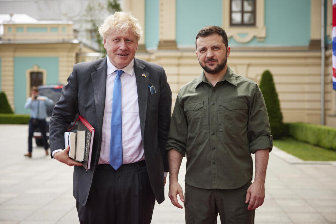 In this image provided by the Ukrainian Presidential Press Office, Ukrainian President Volodymyr Zelenskyy, right, and Britain's Prime Minister Boris Johnson, pose for photo during their meeting in downtown Kyiv, Ukraine, Friday, June 17, 2022.