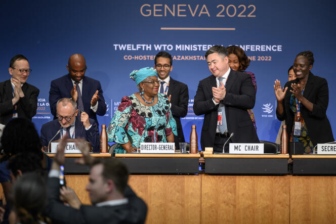 World Trade Organization Director-General Ngozi Okonjo-Iweala, center left, stands next to conference chair Timur Suleimenov, second right, after a closing session of a World Trade Organization Ministerial Conference at the WTO headquarters in Geneva early Friday, June 17, 2022. 