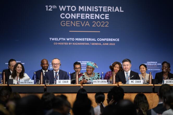 World Trade Organization Director-General Ngozi Okonjo-Iweala (C) delivers her speech during the closing session of a World Trade Organization Ministerial Conference at the WTO headquarters in Geneva on early June 17, 2022. 