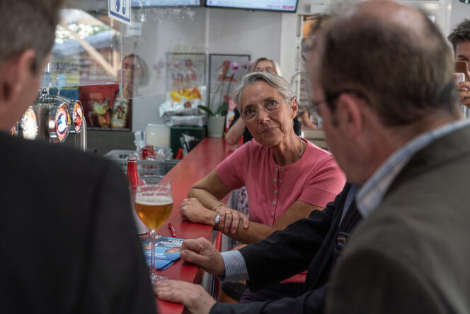 Elisabeth Borne meets residents in a bar in Thury-Harcourt, Calvados, June 16, 2022.