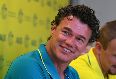 Australian swim coach Jacco Verhaeren (C) speaks during a press conference ahead of the 2018 Gold Coast Commonwealth Games, on the Gold Coast on April 1, 2018. (Photo by William WEST / AFP)