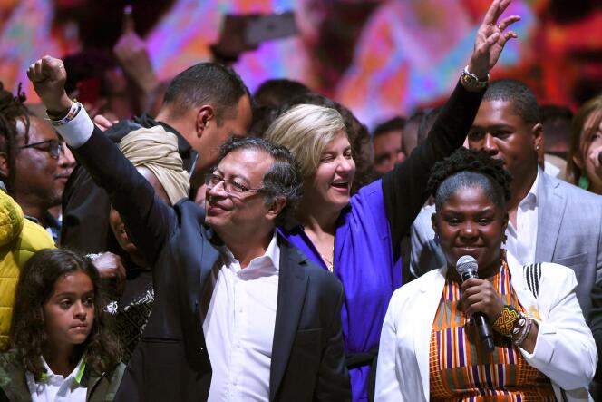 Gustavo Petro, Colombian president elected on Sunday, June 19, 2022, celebrates his victory with his running mate Francia Marquez and his wife, Veronica Alcocer, at the Movistar Arena in Bogota.