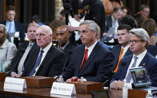 From left, Arizona House Speaker Rusty Bowers, left, Georgia Secretary of State Brad Raffensperger and Georgia Deputy Secretary of State Gabriel Sterling, listen as the House select committee investigating the Jan. 6 attack on the U.S. Capitol continues, at the Capitol in Washington, Tuesday, June 21, 2022. (AP Photo/J. Scott Applewhite)