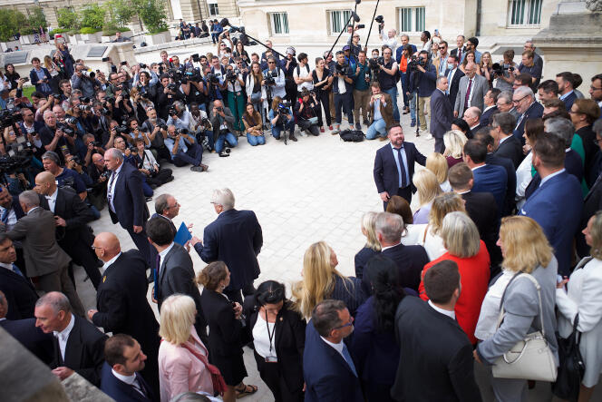 The Rassemblement National group preparing to take its group photo on the steps of the court of honor of the Palais-Bourbon, June 22, 2022, in Paris.