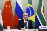 Vladimir Poutine en visioconférence, à Moscou, à l’occasion de la cérémonie d’ouverture du 14e sommet des BRICS à Pékin, le 23 juin 2022.


