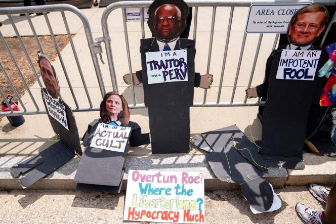 Signs attacking the Supreme Court justices after the overturning of Roe v. Wade outside the courthouse in Washington, D.C., on June 24, 2022.