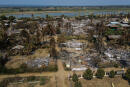 This handout photo by Chin Twin Chit Thu taken on February 3, 2022 and released on taken on February 5, 2022 shows an aerial photo of burnt buildings from fires in Mingin Township, in Sagaing Division, where more than 105 buildings were destroyed by junta military troops, according to local media. (Photo by Handout / Chin Twin Chit Thu / AFP) / RESTRICTED TO EDITORIAL USE - MANDATORY CREDIT “ AFP PHOTO / Chin Twin Chit Thu” - NO MARKETING - NO ADVERTISING CAMPAIGNS - DISTRIBUTED AS A SERVICE TO CLIENTS