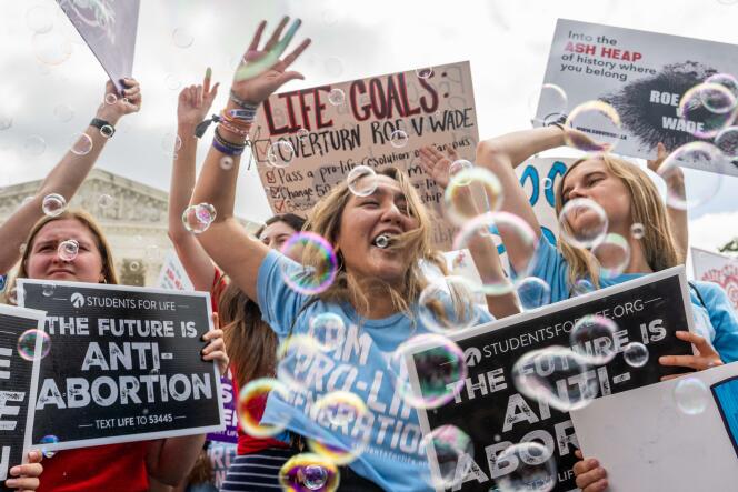 Anti-abortion activists celebrate in front of the U.S. Supreme Court on June 24, 2022 in Washington, DC. 
