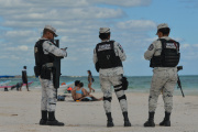 The National Guard patrols Playa Pescadores, in Tulum, Mexico, on November 8, 2021.