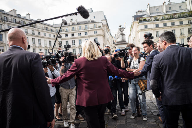Marine Le Pen meets with RN MPs in front of the Assemblée Nationale on June 22, 2022.