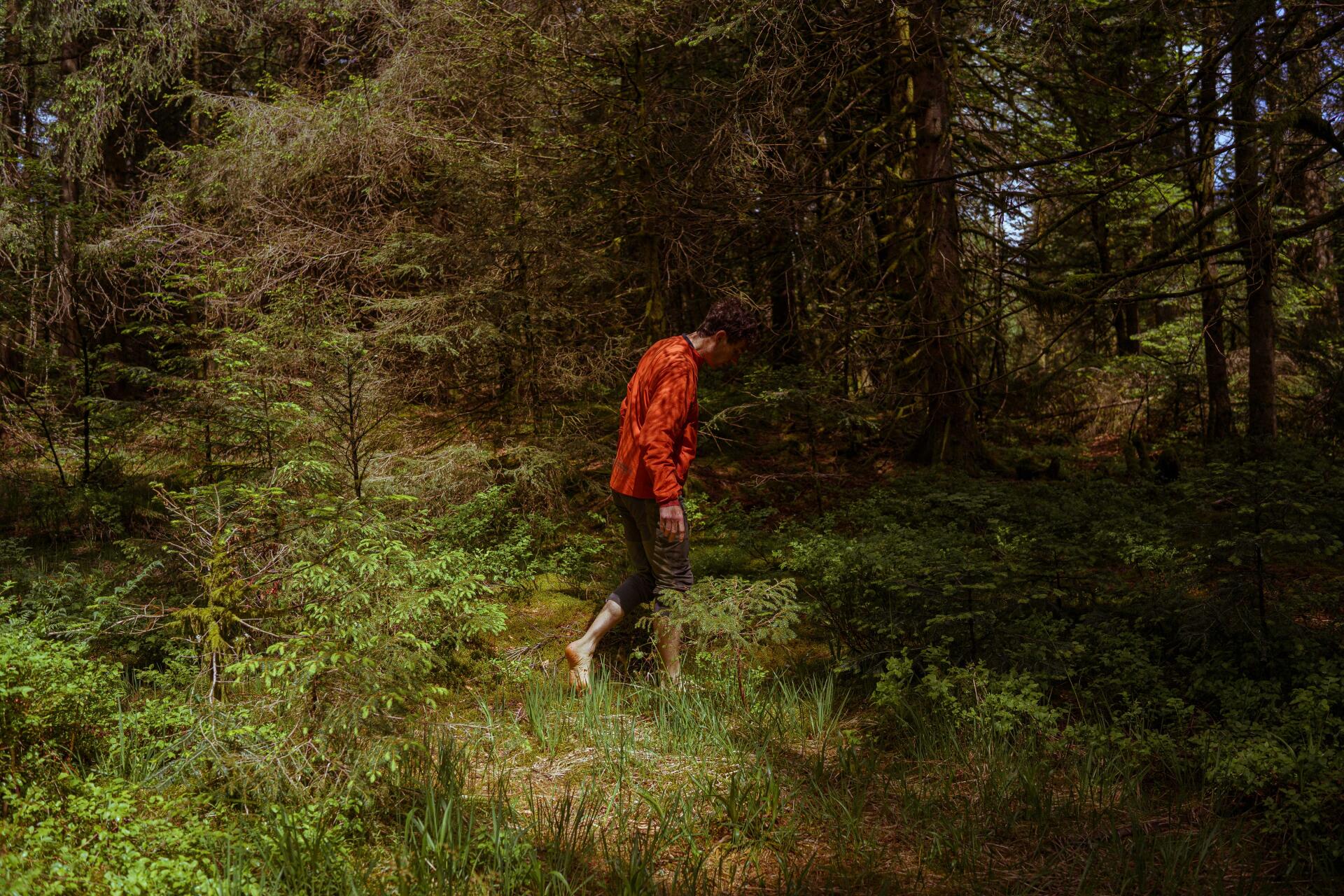 Eric Brisbare walks barefoot on sphagnum moss in the Charmes peat bog nature reserve in Rupt-sur-Moselle (Vosges), May 16, 2022.