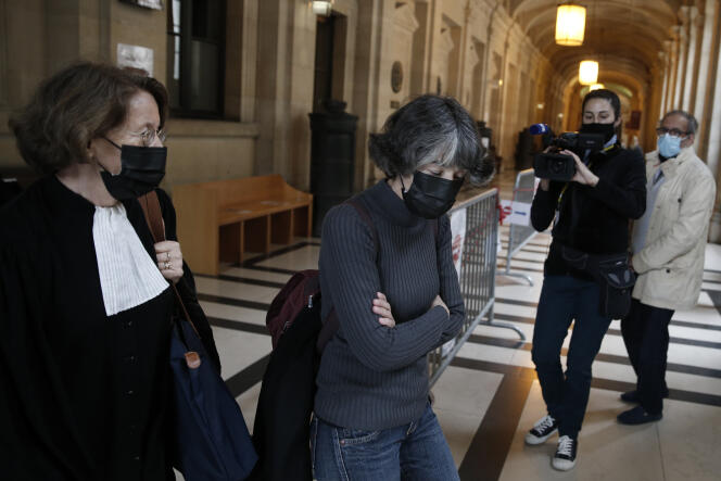 Italian Roberta Capelli, center, and her lawyer Irene Terrel arrive for an extradition hearing in Paris on Wednesday, June 23, 2021.