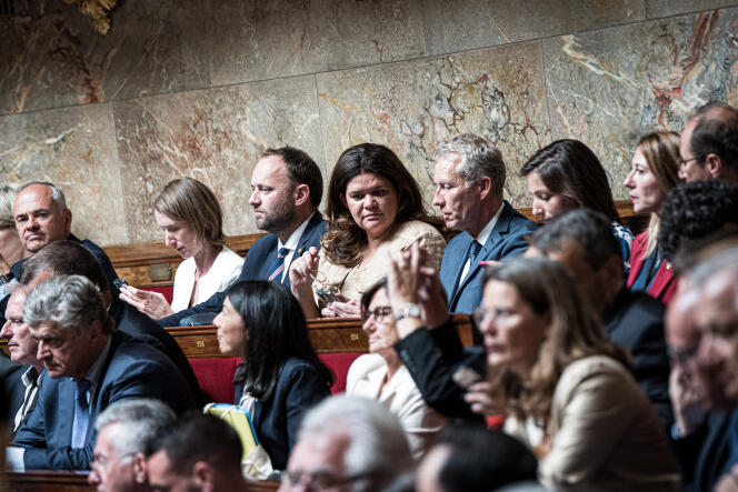 MPs Raquel Garrido (back row, center) and Guillaume Garrot (to her left) during the election of the president of the Assemblée Nationale in Paris on June 28, 2022.