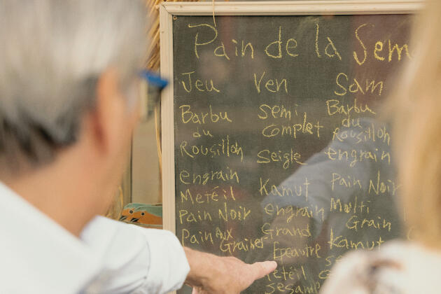 In the window of his bakery in Montmartre, Shinya Inagaki lists the breads available the week of June 10.
