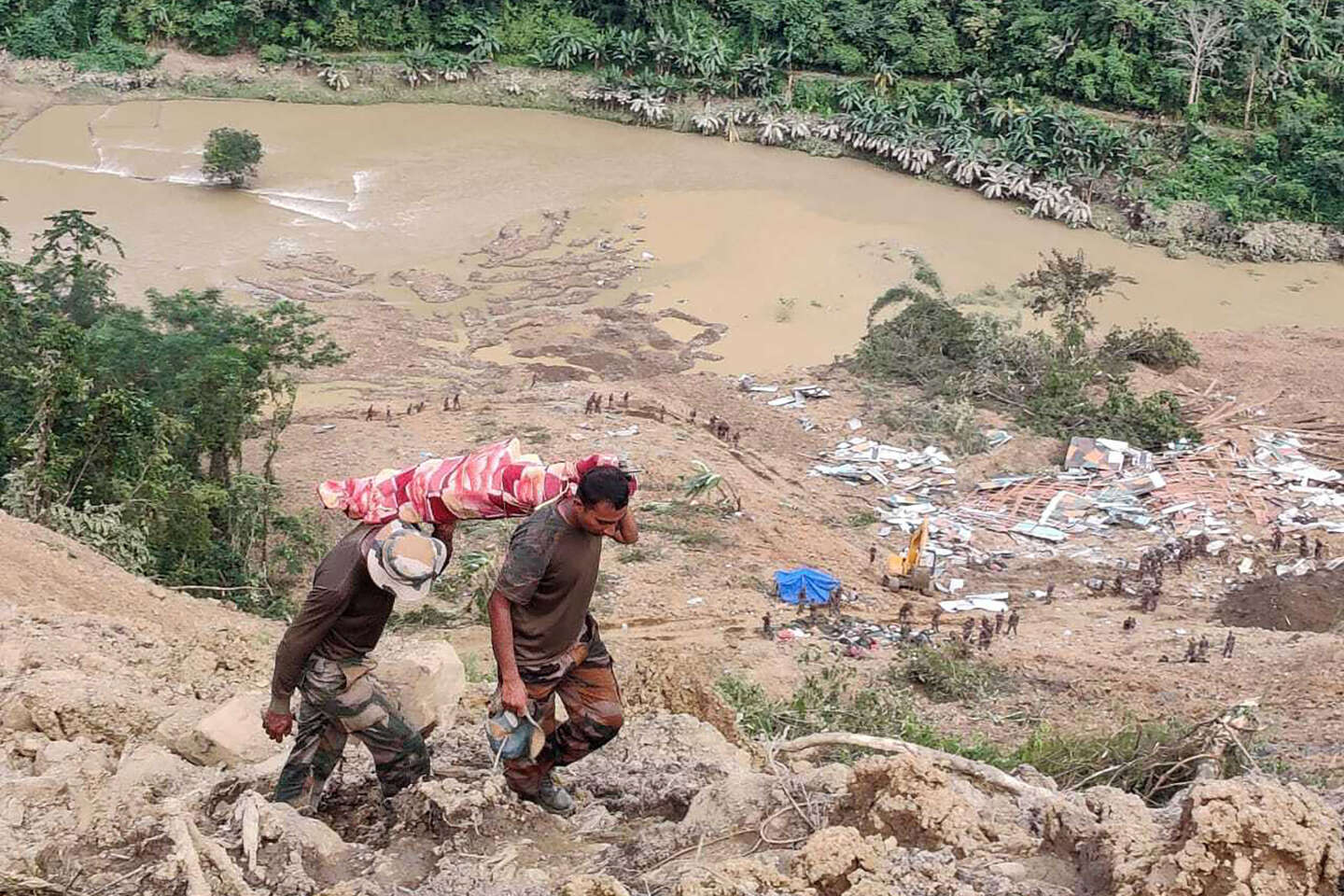 In India, landslides leave dozens dead and missing