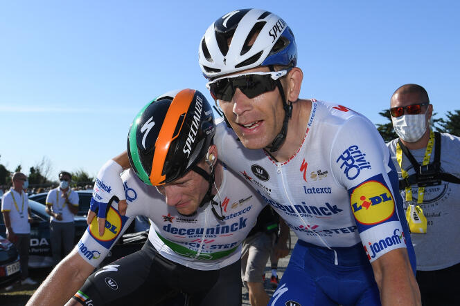 Michael Morkov (right) celebrates the victory of his sprinter, Sam Bennett during the 10th stage of the 2020 Tour de France on September 8, 2020, in Saint-Martin-de-Ré.
