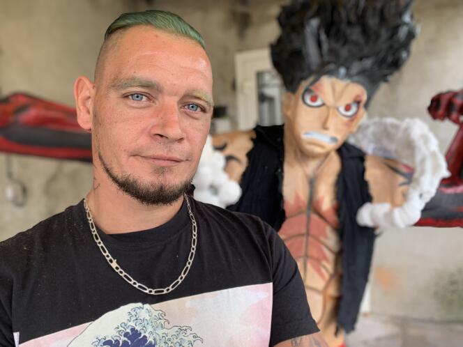 Christophe Desneuil, in his studio in Saint-Maxir (Deux Sevres), in front of a statue of Luffy, a hero 