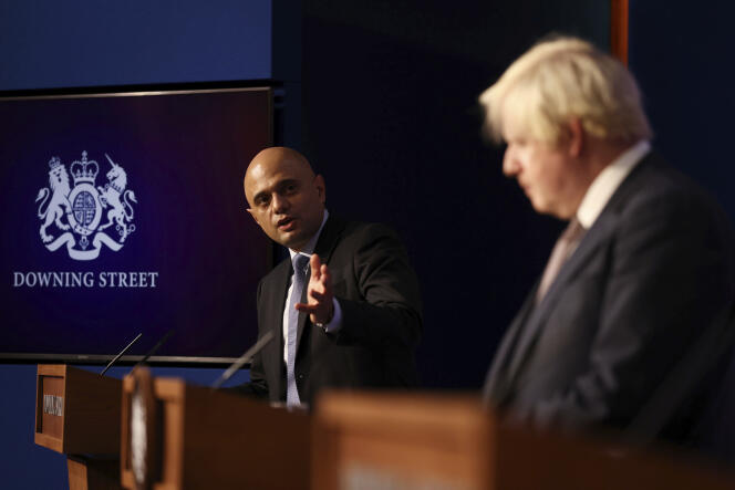Britain's Health Secretary Sajid Javid, left, and Prime Minister Boris Johnson during a media briefing on the Covid-19 pandemic in Downing Street, London, on November 30, 2021.