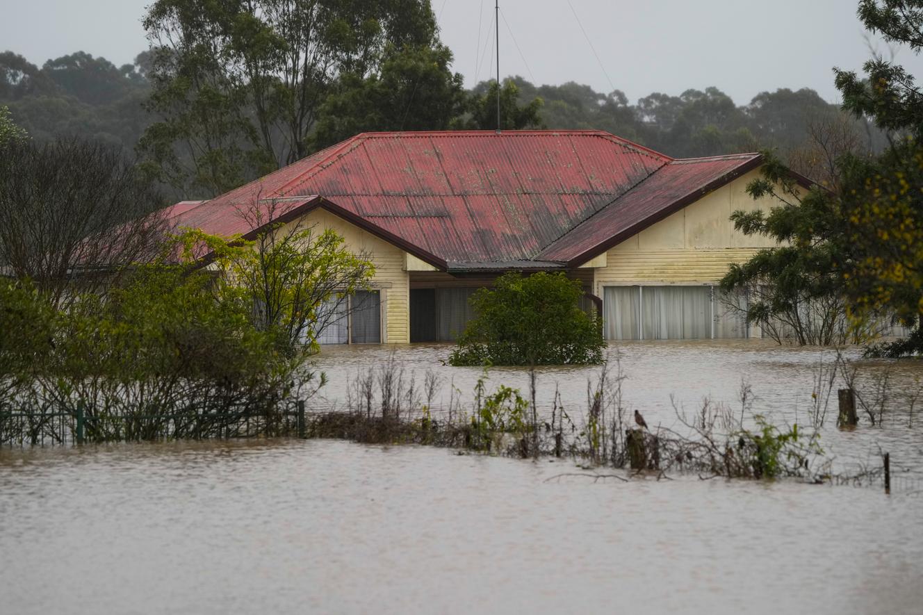 A house has been flooded in Windsor, a suburb of Sydney, Australia. The country is particularly affected by climate change.