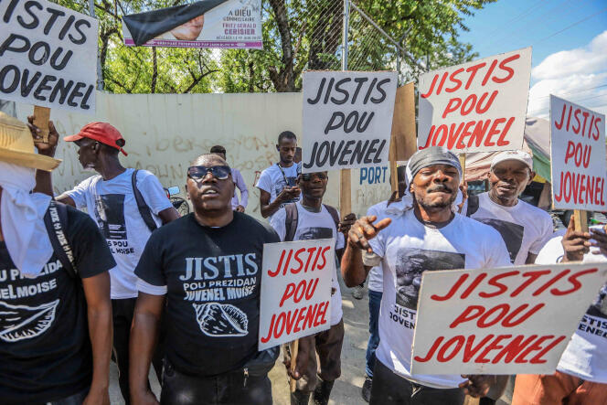 A group of activists demand justice for former Haitian President Jovenel Moise, in Port-au-Prince, October 6, 2021.