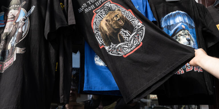 T-shirts with Russian inscriptions, such as “My territory, my rules” and “Glory to Airborne Forces” are sold at a Daugavpils market.