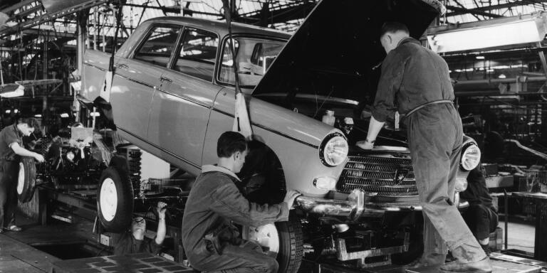 Production line mechanics working on a new Peugeot car in the assembly shop at Sochaux, 1960s (Photo by Archive Photos/Getty Images)