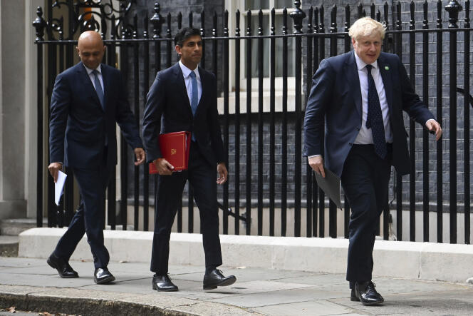 From left, British Health Secretary Sajid Javid, Chancellor of the Exchequer Rishi Sunak and Prime Minister Boris Johnson arrive at No 9 Downing Street for a media briefing on May 7, 2021. The contest to succeed British Prime Minister Boris Johnson has no single frontrunner but there are many prominent contenders.