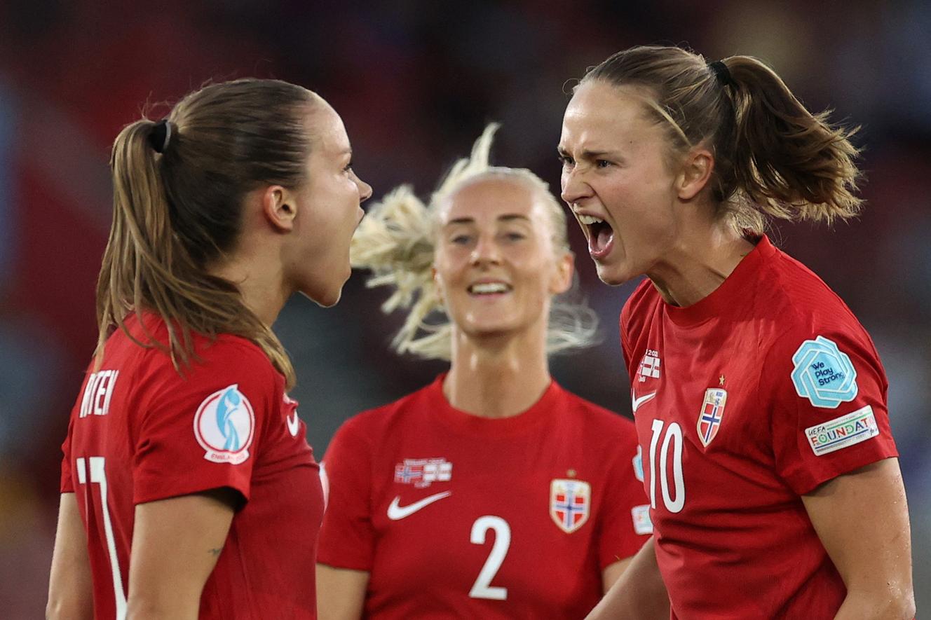 Norway's Guro Reiten (left) and Caroline Graham Hansen (right) celebrate a goal under the eyes of their teammate Anja Sonstevold during their Euro 2022 win over Northern Ireland (4-1) at St. Mary's Stadium on July 7. , Southampton.