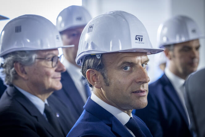 Emmanuel Macron and European Commissioner for the Internal Market Thierry Breton visit the STMicroelectronics plant in Crolles (Isère) on July 12, 2022.