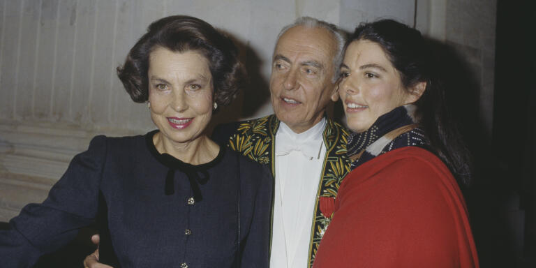 French L'Oreal heiress, socialite, businesswoman and philanthropist Liliane Bettencourt, her husband politician Andre Bettencourt, and their daughter Françoise Bettencourt-Meyers attend his welcome ceremony at the Academie Française. Andre Bettencourt is elected member of the Fine Arts Academy on March 23, 1988 at the seat of Michel Fare. (Photo by Pierre Vauthey/Sygma/Sygma via Getty Images)