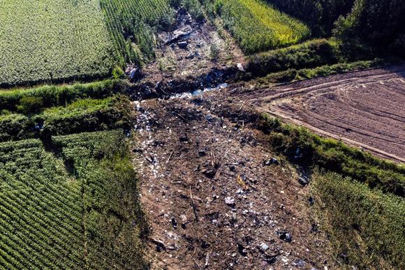 A view of the crash site of a Ukrainian-owned Antonov An-12 cargo plane near Kavala, Greece, on July 17, 2022.