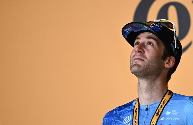 Israel-Premier Tech Canadian rider Hugo Houle celebrates on the podium after winning the 16th stage of the Tour de France, in Foix in southern France, on July 19, 2022.