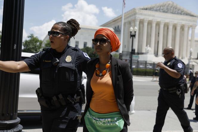 Rep. Ilhan Omar (D-MN) is detained by US Capitol Police Officers in front of the US Supreme Court on July 19, 2022