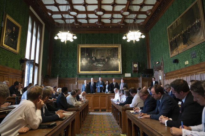 Sir Graham Brady (third from left), chairman of the 1922 Committee, announces the results of the ballot for the final two candidates for the leadership of the Conservative Party, in the Houses of Parliament, in London, July 20, 2022. 
