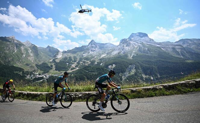 B&B Hotels-KTM team's French rider Pierre Rolland (second from the left) and B&B Hotels-KTM team's Austrian rider Sebastian Schonberger (right) cycle in the final kilometers during the 18th stage of the Tour de France cycling race on July 21, 2022.