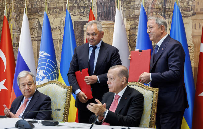 Recep Tayyip Erdogan (seated, right), UN Secretary-General Antonio Guterres (seated, left), Russian Defense Minister Sergei Shoigu (standing, left), and Turkish Defense Minister Hulusi Agar (right) at Dolmabahce Palace in Istanbul in July.  22, 2022.
