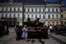 People visit an exhibition of destroyed Russian military vehicles and weapons, as Russia's attack on Ukraine continues, at Mykhailivska Square, in Kyiv, Ukraine, July 23, 2022. REUTERS/Alkis Konstantinidis TPX IMAGES OF THE DAY