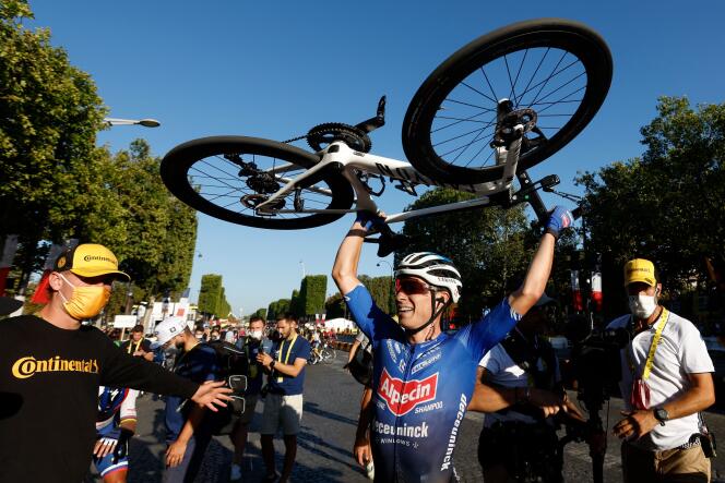 Alpecin-Deceuninck team's Belgian rider Jasper Philipsen celebrates after winning the 21st and final stage of the Tour de France on the Champs-Elysées in Paris, France, on July 24, 2022. 
