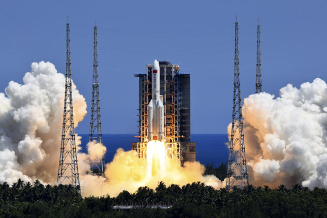 The Long March 5B Y3 carrier rocket blast off from the Wenchang Space Launch Center in Wenchang in southern China's Hainan Province Sunday, July 24, 2022. 