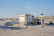 A caravan set up for the summer by the village of Beauduc in June 2022