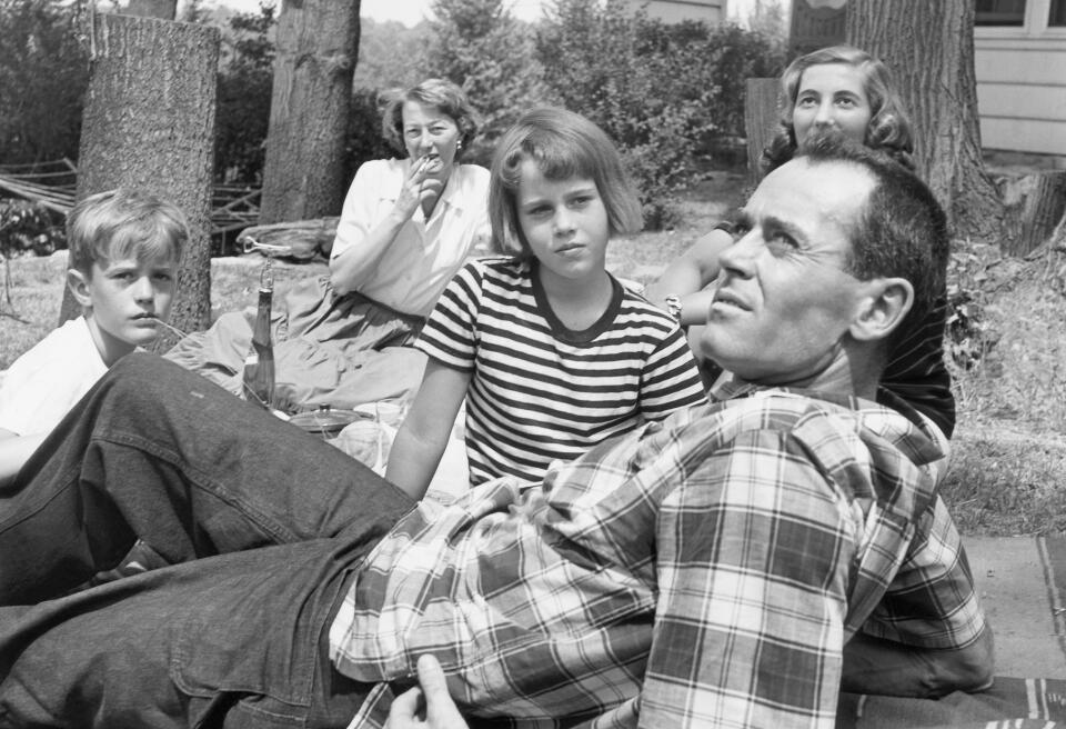 1949: The Fonda Family (L-R: Peter Fonda, Frances Fonda, Jane Fonda, Frances de Villers Brokaw and Henry Fonda) enjoy a picnic in 1949. (Photo by Genevieve Naylor/Corbis via Getty Images)