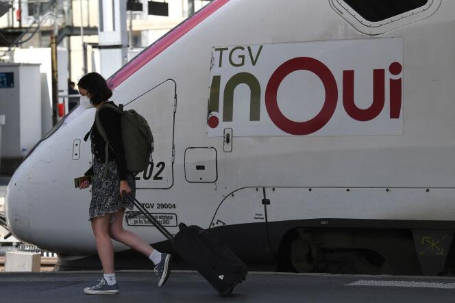 A passenger on a train at Gare de Lyon in Paris, July 29, 2022.