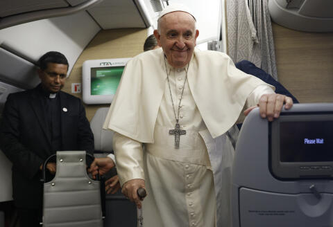 Pope Francis speaks to journalists aboard the papal flight back from Canada Saturday, July 30, 2022, where he paid a six-day pastoral visit. Pope Francis wrapped up his Canadian pilgrimage by meeting with Indigenous delegations and visiting Inuit territory in northern Nunavut. In one of his addresses, he assailed the Catholic missionaries who "supported oppressive and unjust policies" against Native peoples in the country's notorious residential schools and vowed to pursue truth and healing. (Guglielmo Mangiapane/ Pool via AP)