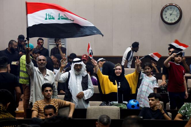 Iraqis supporting political leader Moqtada al-Sadr, in parliament, Baghdad, July 31, 2022.