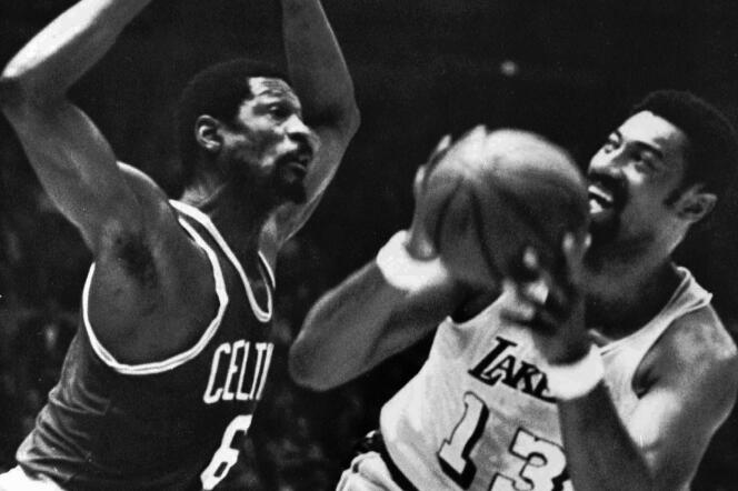 Wilt Chamberlain (right), Lakers player, blocked by Celtics basketball player Bill Russell (left) during the NBA Finals in Los Angeles, May 5, 1969.
